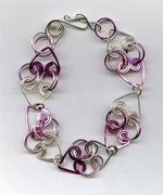 Pink and silver heart bracelet